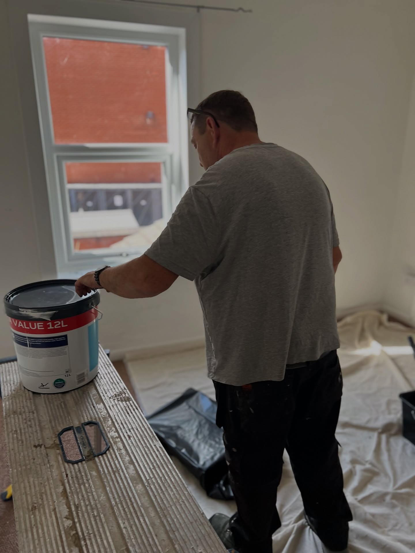 Decorator working on an East Midlands refurbishment