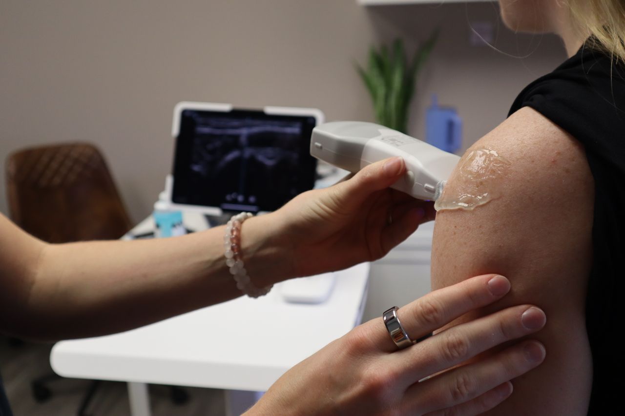 woman having an ultrasound for her arm pain woman having an ultrasound for her arm pain