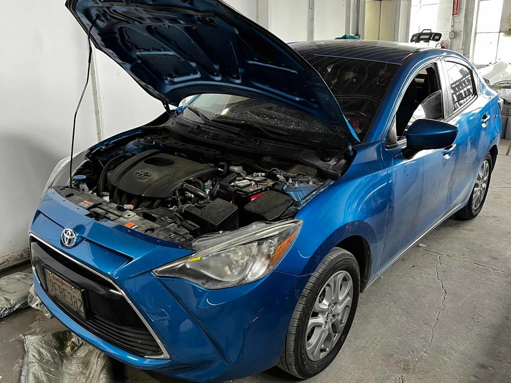 Dent removal and panel repair at Focus On Cars, Riverside, CA