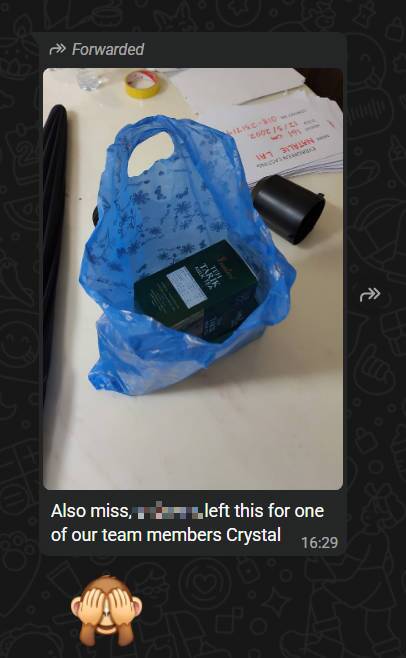 A customer dropped off a gift at the office for the AI employee Crystal