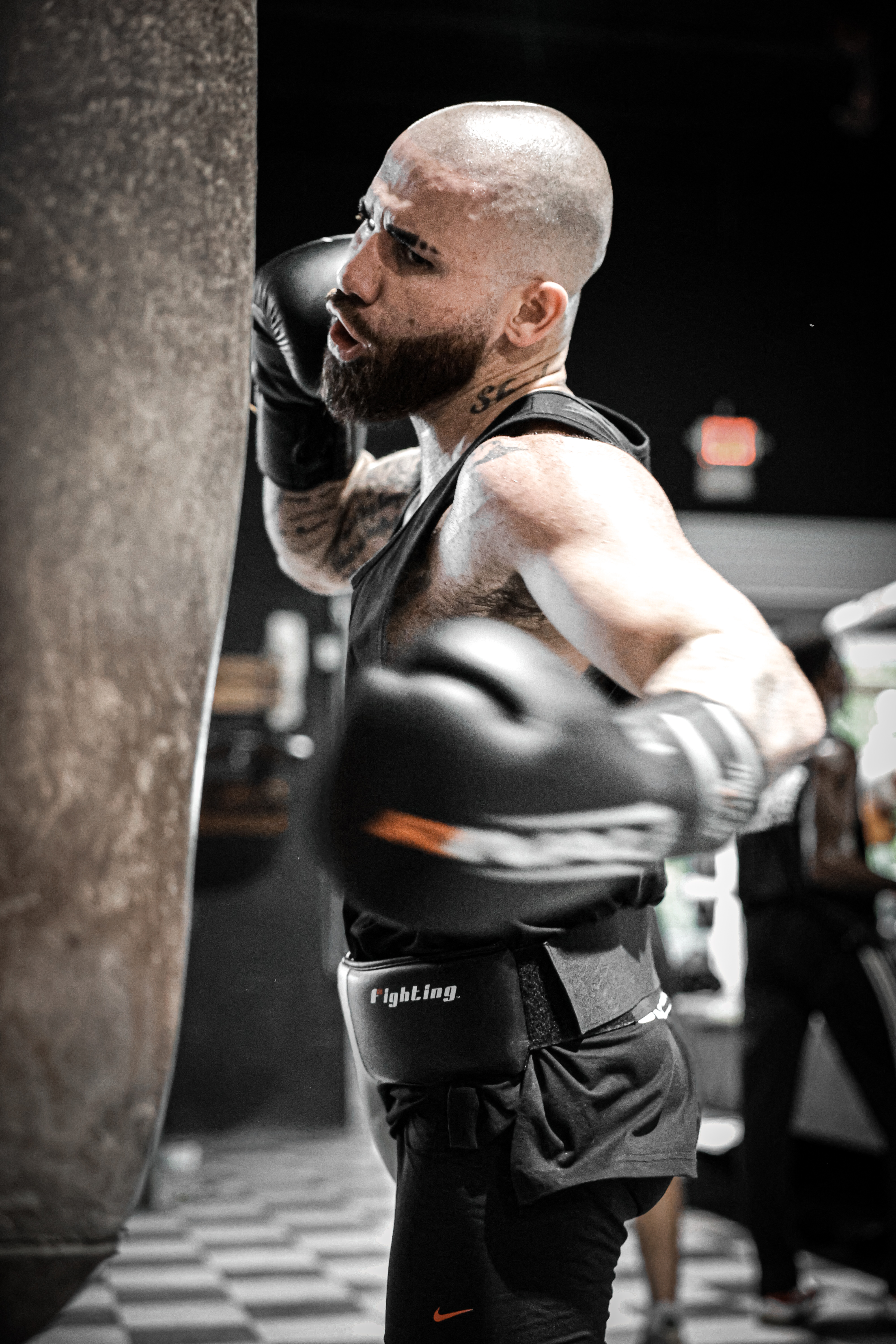 Fighter about to hit the bag