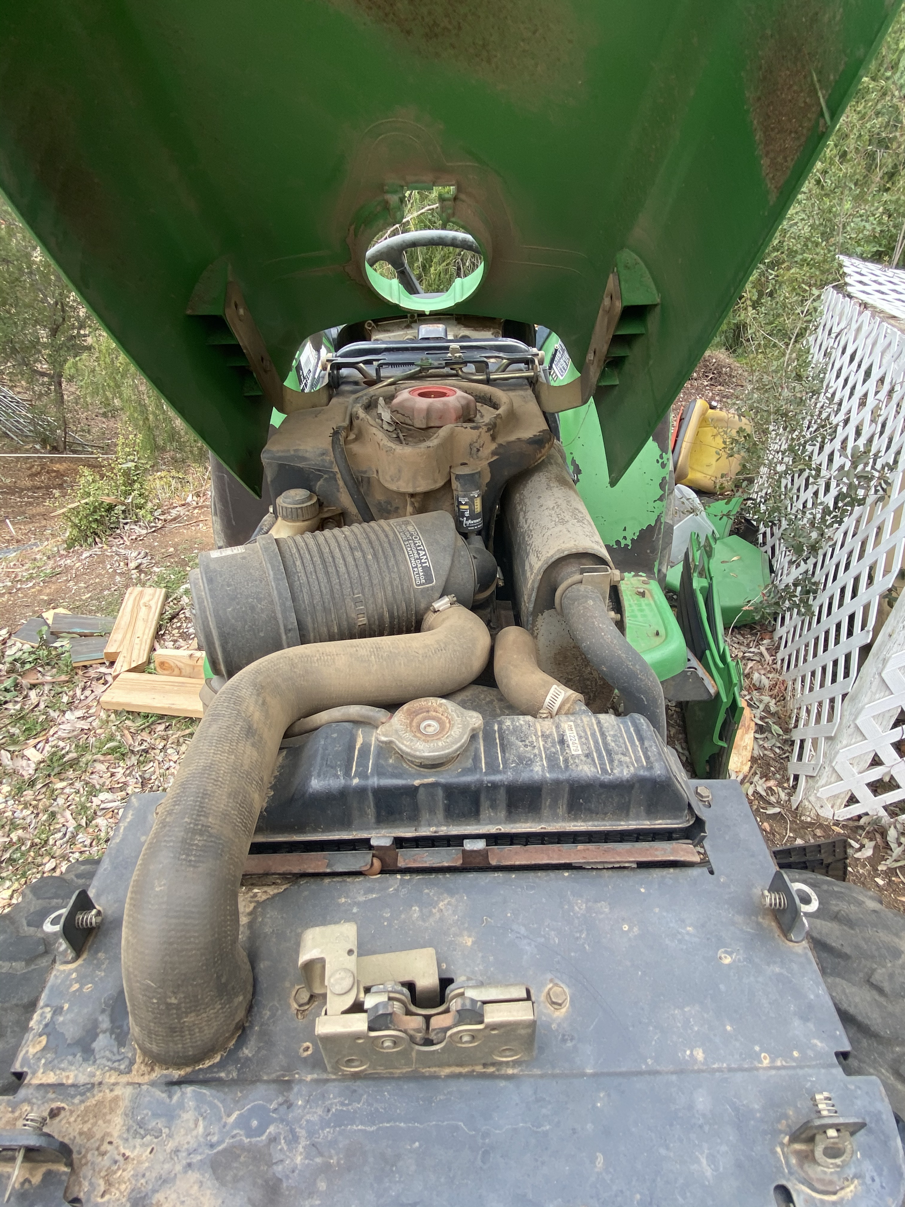 John Deere engine bay open for maintenance