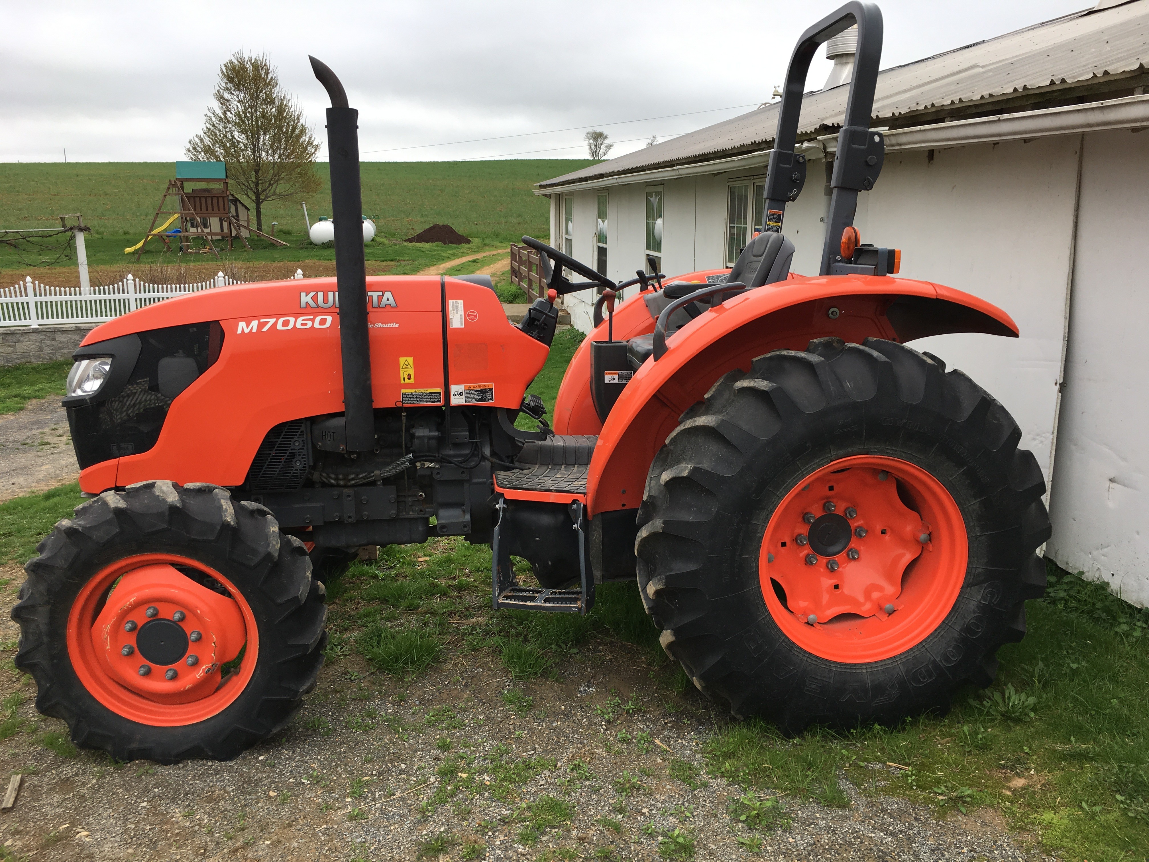 Kubota tractor with front loader at a San Diego property