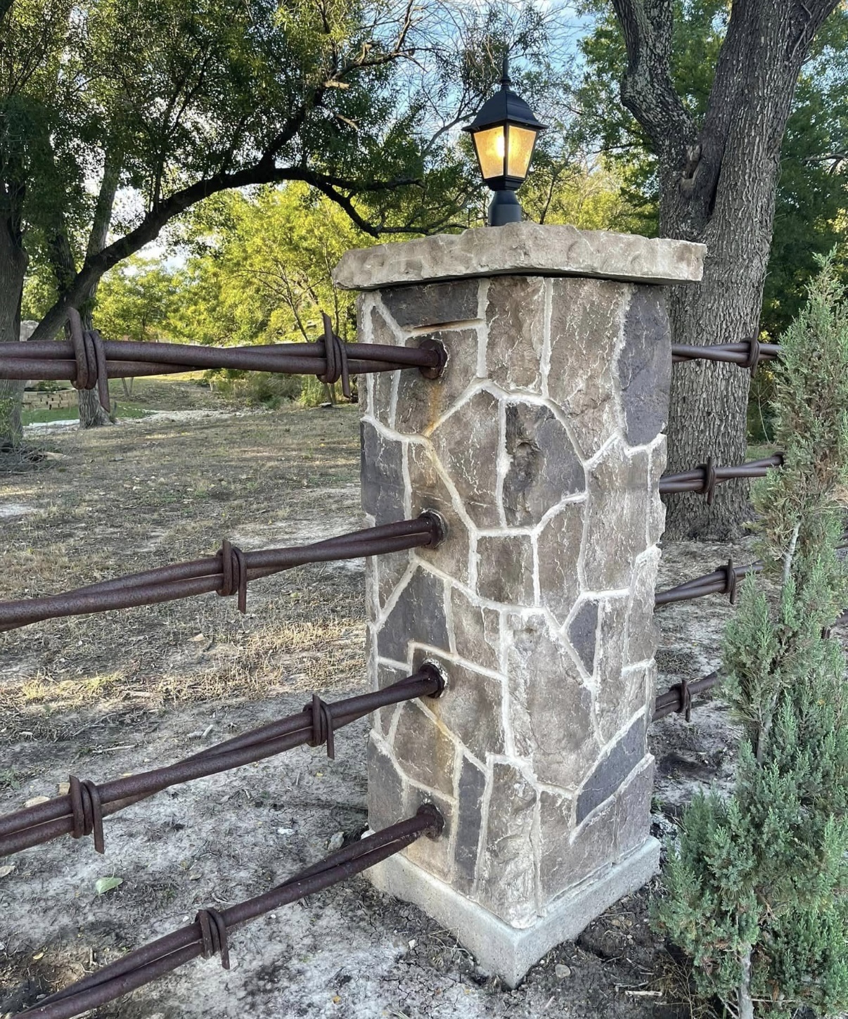 Stone Pillar with Iron Gate Posts