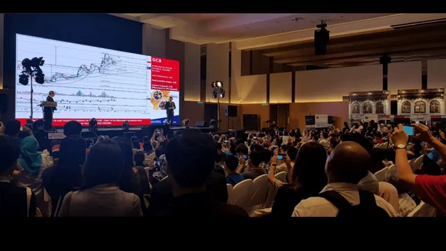 Ezone Constantine speaking at a live event