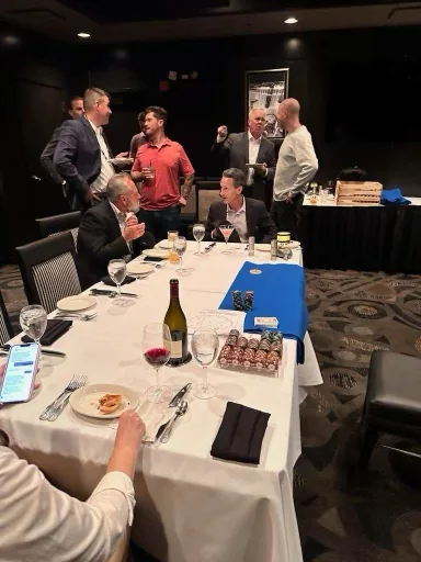 Client networking poker event for corporate relationship building and entertainment