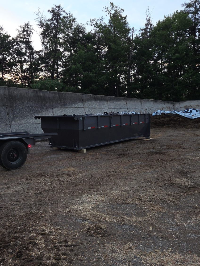 Pangborn Enterprises roll-off truck on a job site in Warren County, PA