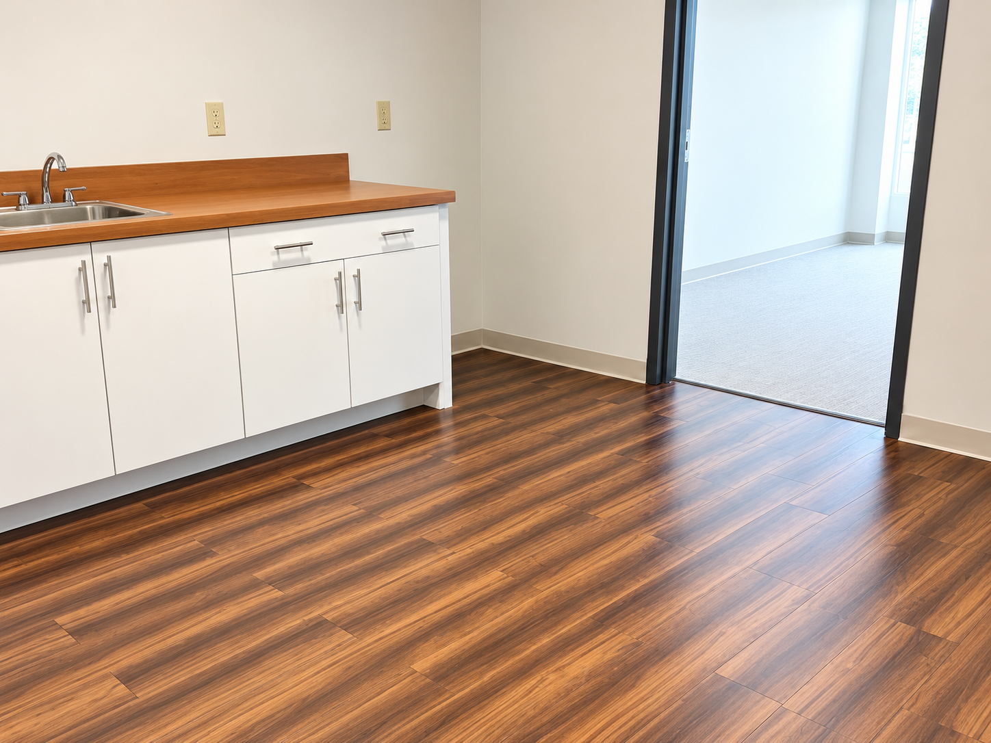 Kean University - Cleaned suite kitchen with wood-look flooring and custom cabinetry