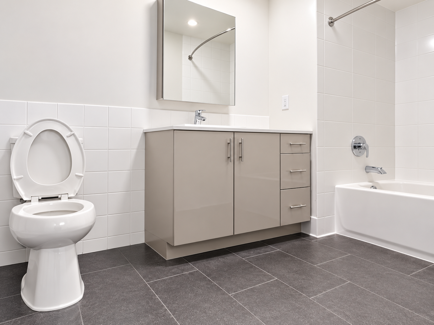 Marin Boulevard - Contemporary luxury bathroom with floating-style vanity and tiled bath