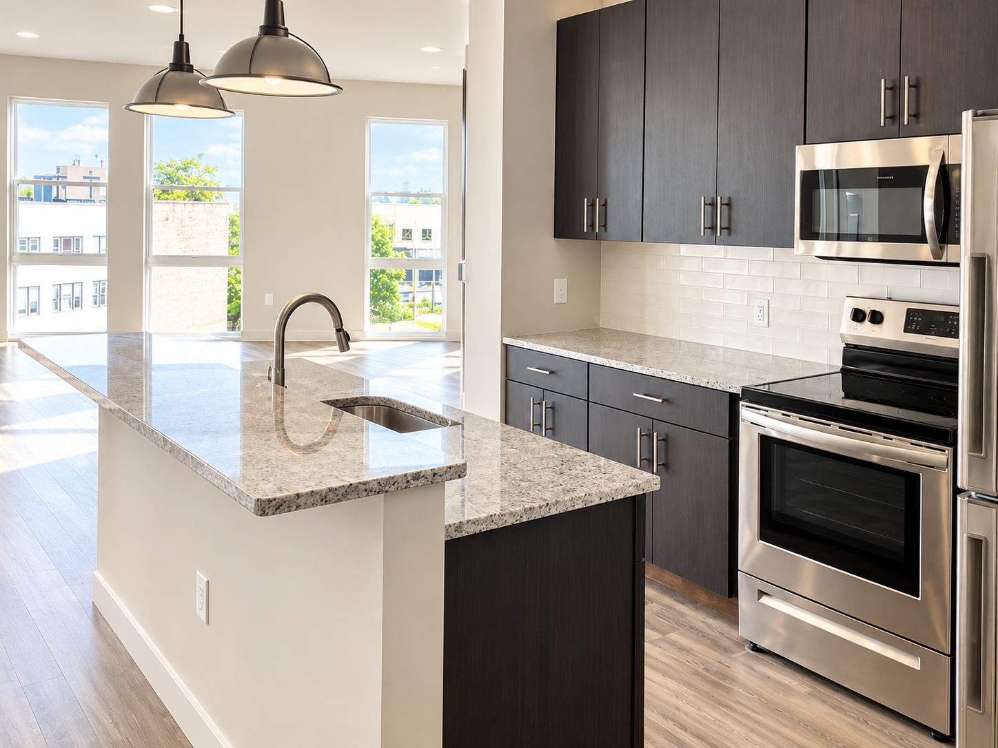 Main Street - Completed kitchen island with gooseneck faucet and stainless microwave