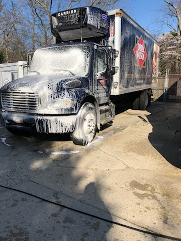 Hempstead — Commercial plaza — storefront cleaned