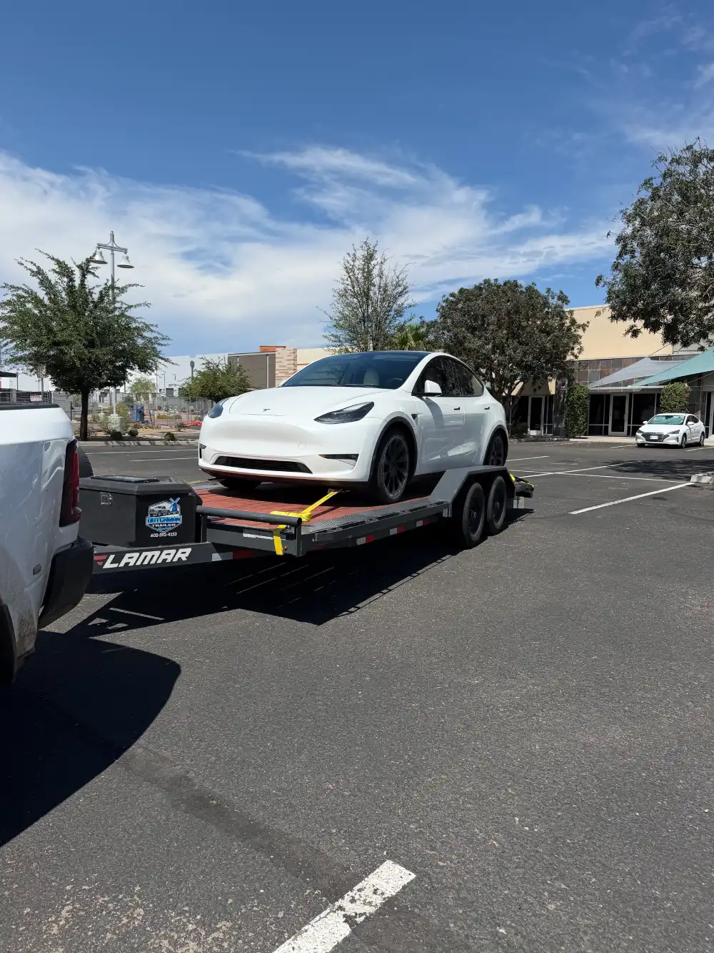 Dutchman Trailer Rentals hauling truck and trailer