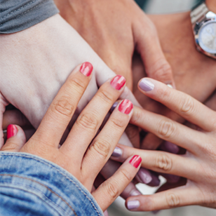 Hands holding together in support