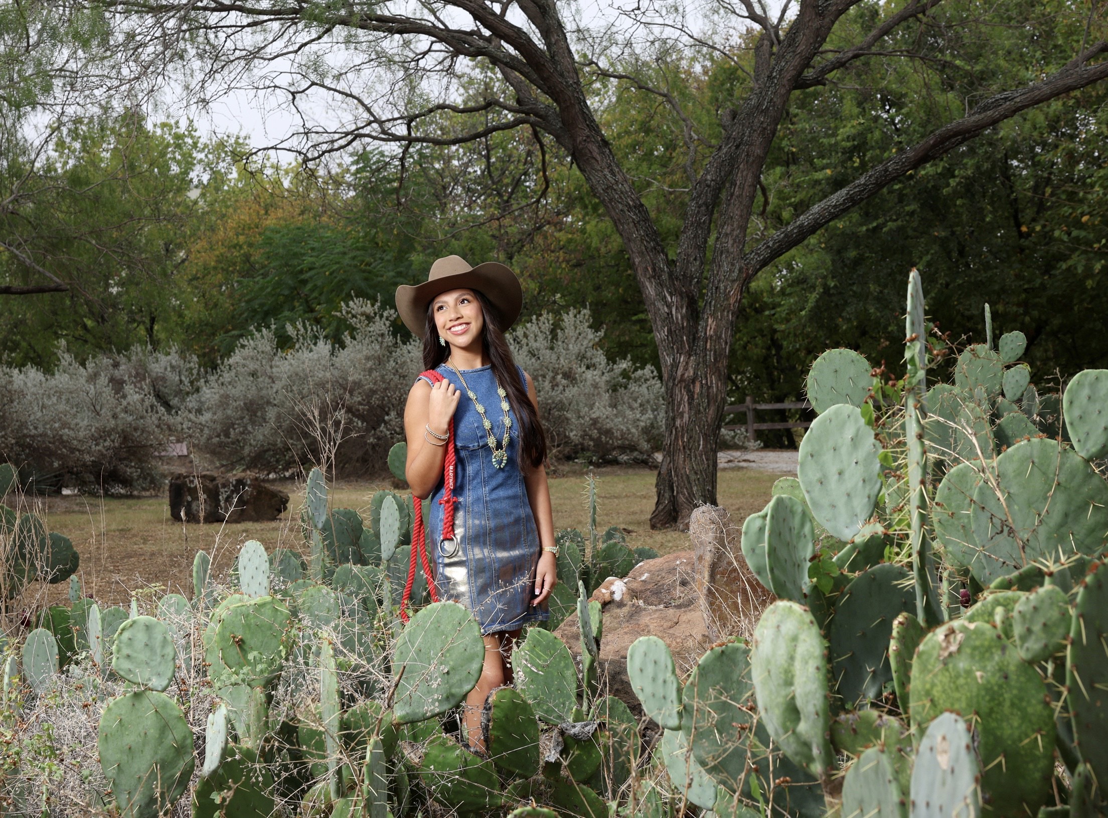 woman in green dress painting