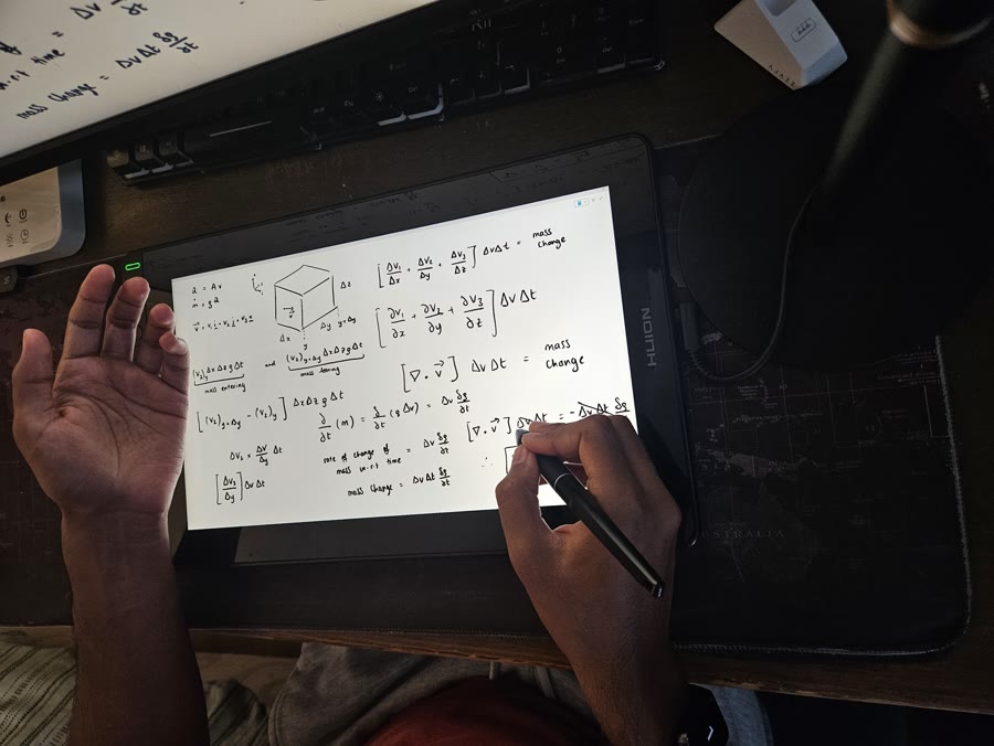 Pawan writing maths on a graphics tablet