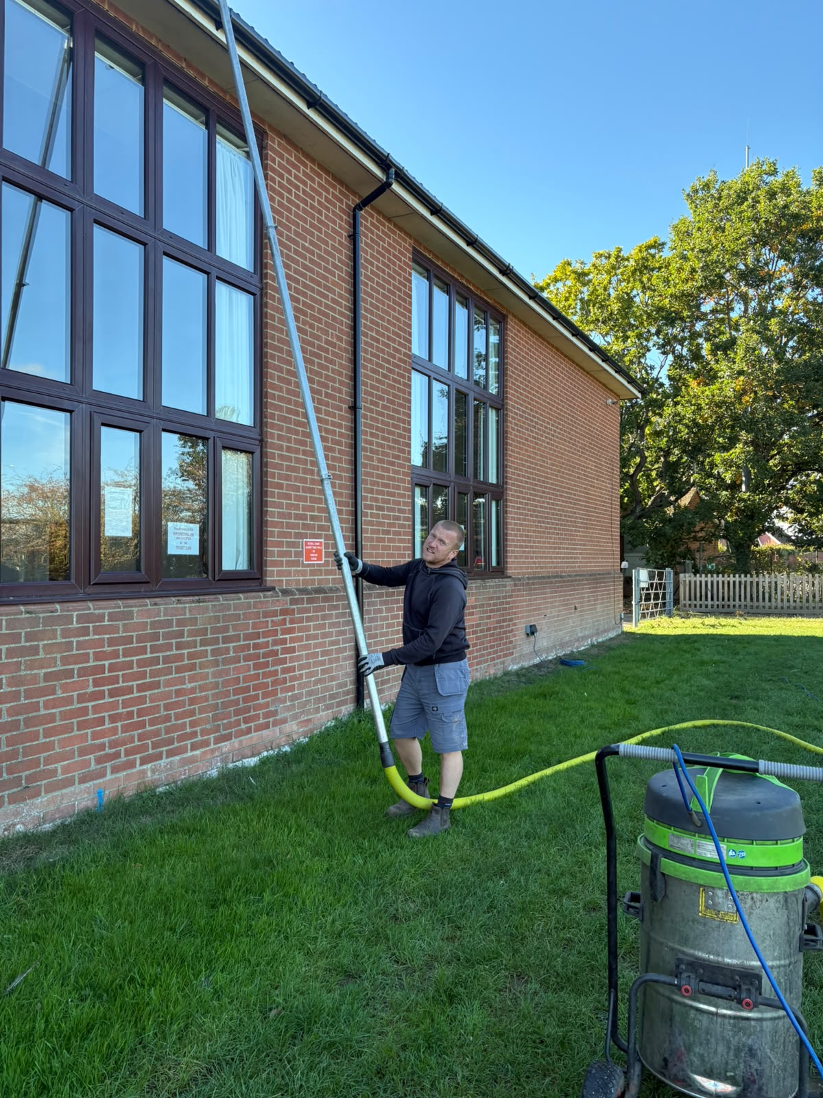 Vacuum and pole set up on a commercial job
