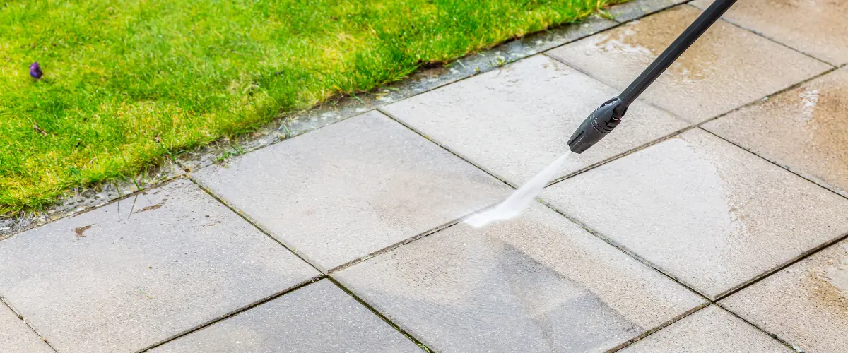 Professional driveway pressure washing using surface cleaner too