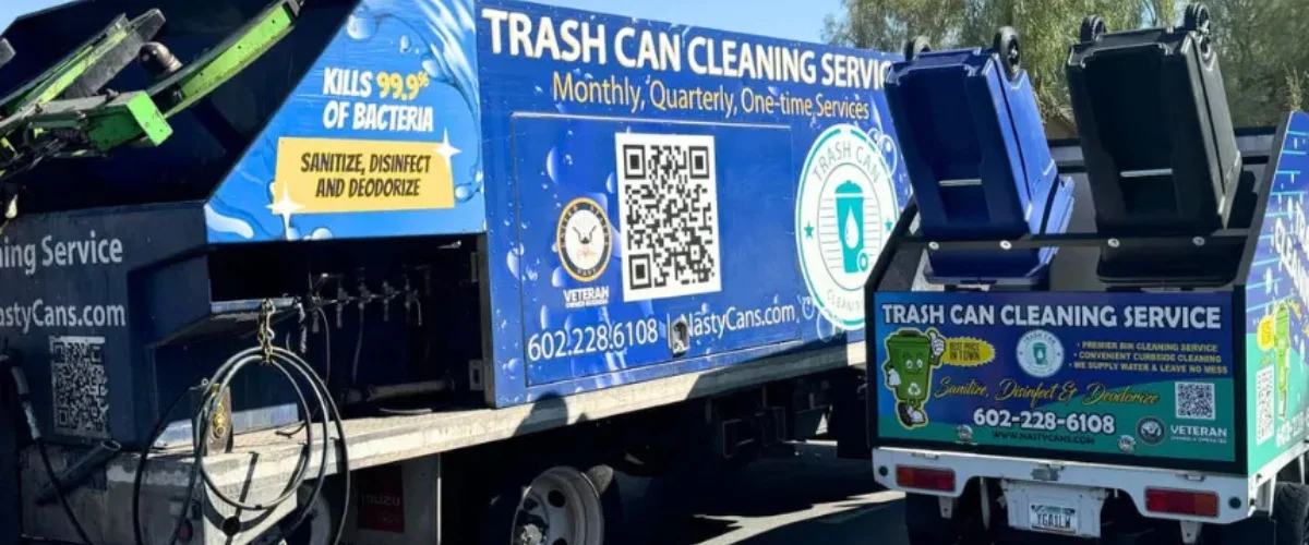 Two blue and green trash can cleaning service trucks with branding and QR codes parked on a sunny day. Two blue and green trash can cleaning service trucks with branding and QR codes parked on a sunny day.