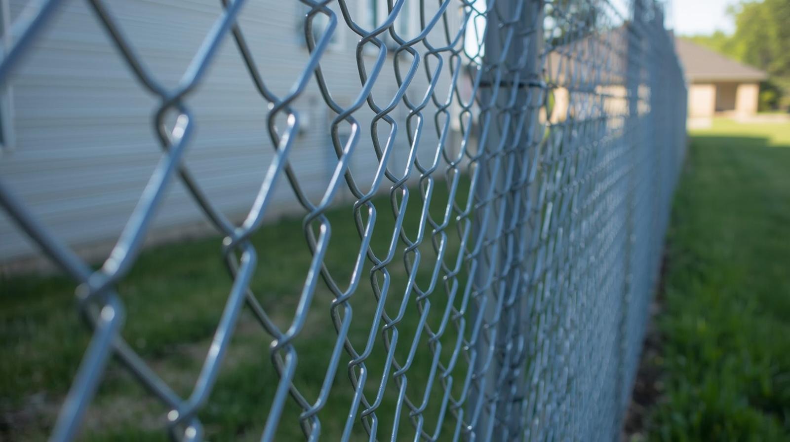 Chain link fence installation project in Northern Illinois showing materials and pricing considerations.