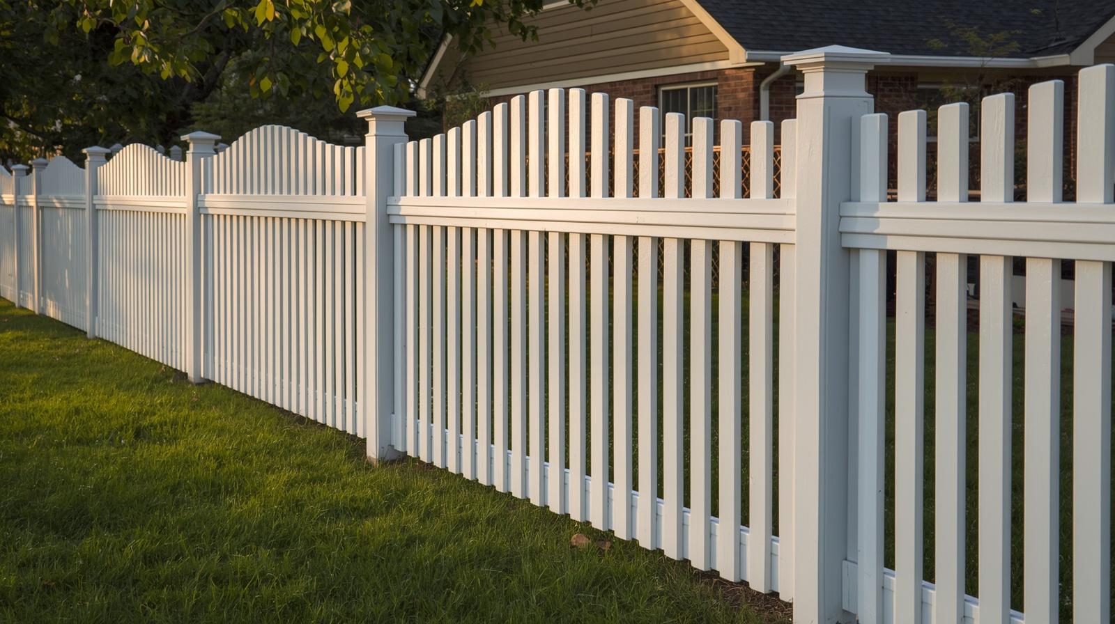 Fence installation in Janesville WI showing terrain and material cost factors.