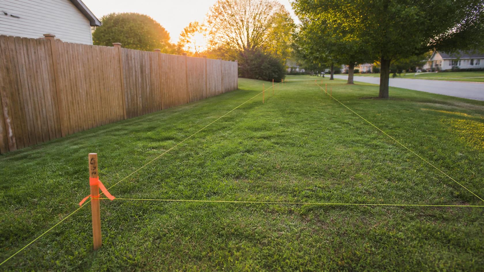 Property being prepared for fence installation in Rockford IL.