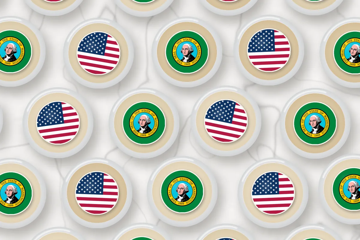 Cocktails topped with edible drink toppers printed with the Washington state flag and the American flag