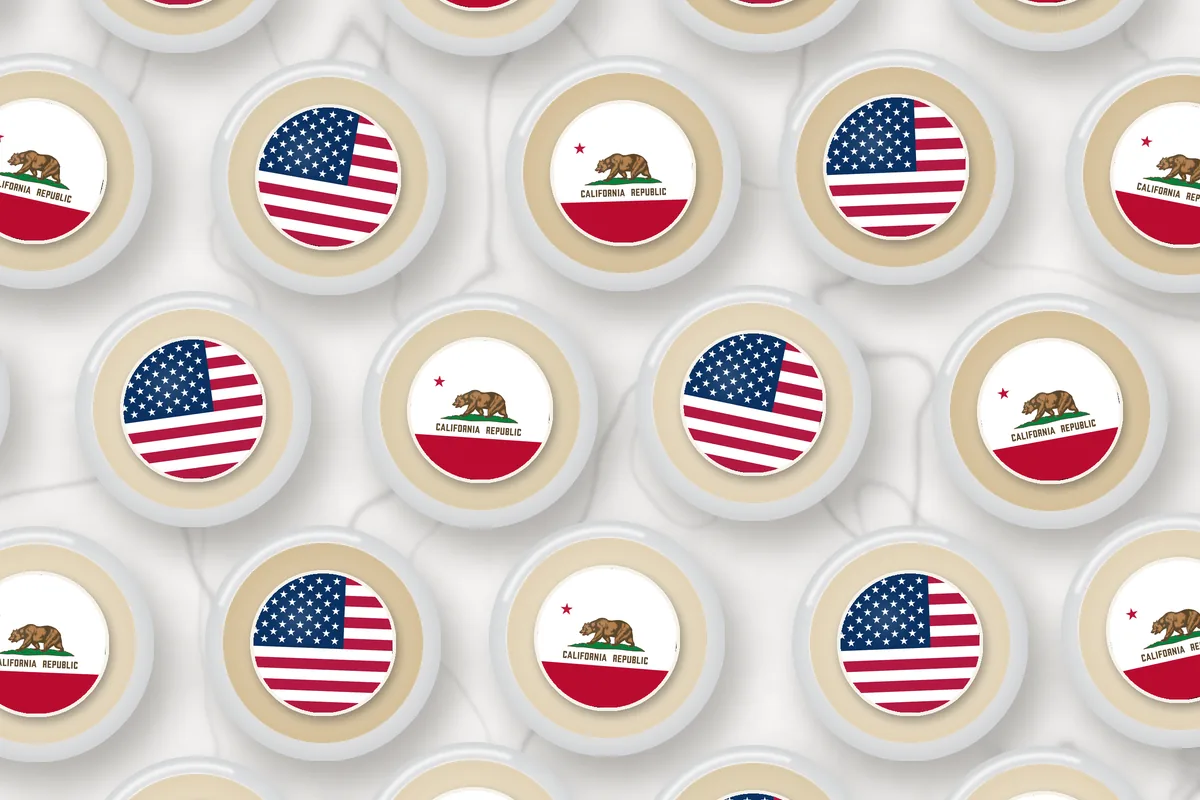 Cocktails topped with edible drink toppers printed with the California flag and the American flag