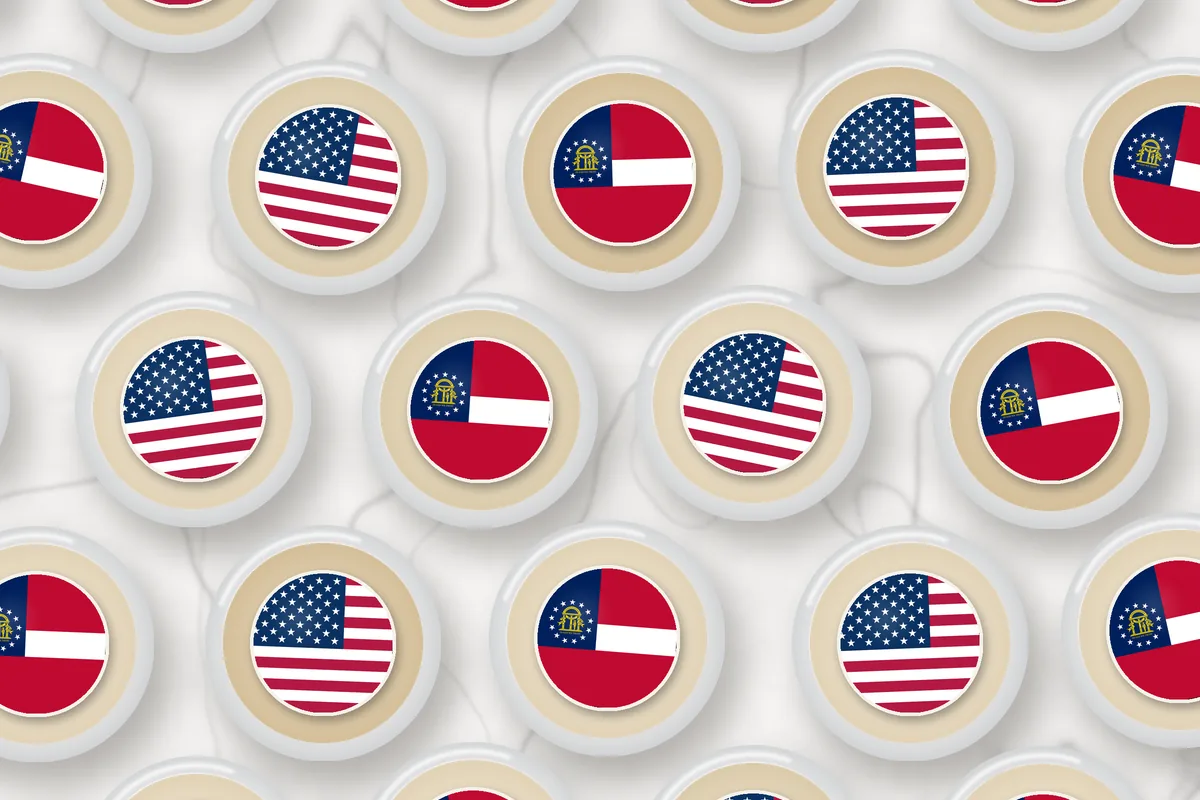Cocktails topped with edible drink toppers printed with the Georgia flag and the American flag
