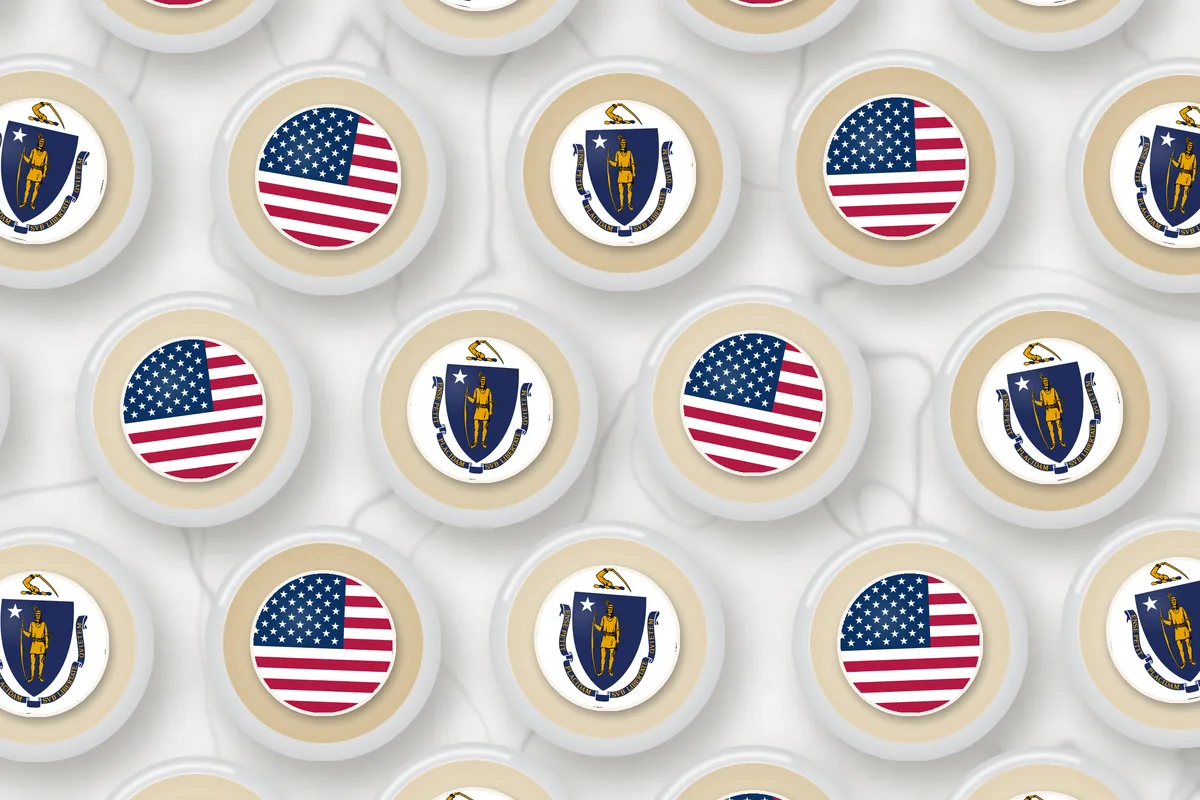 Cocktails topped with edible drink toppers printed with the Massachusetts flag and the American flag
