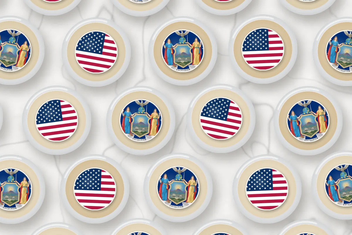 Cocktails topped with edible drink toppers printed with the New York flag and the American flag