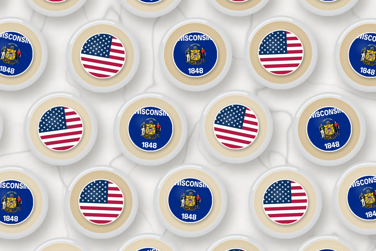 Cocktails topped with edible drink toppers printed with the Wisconsin flag and the American flag