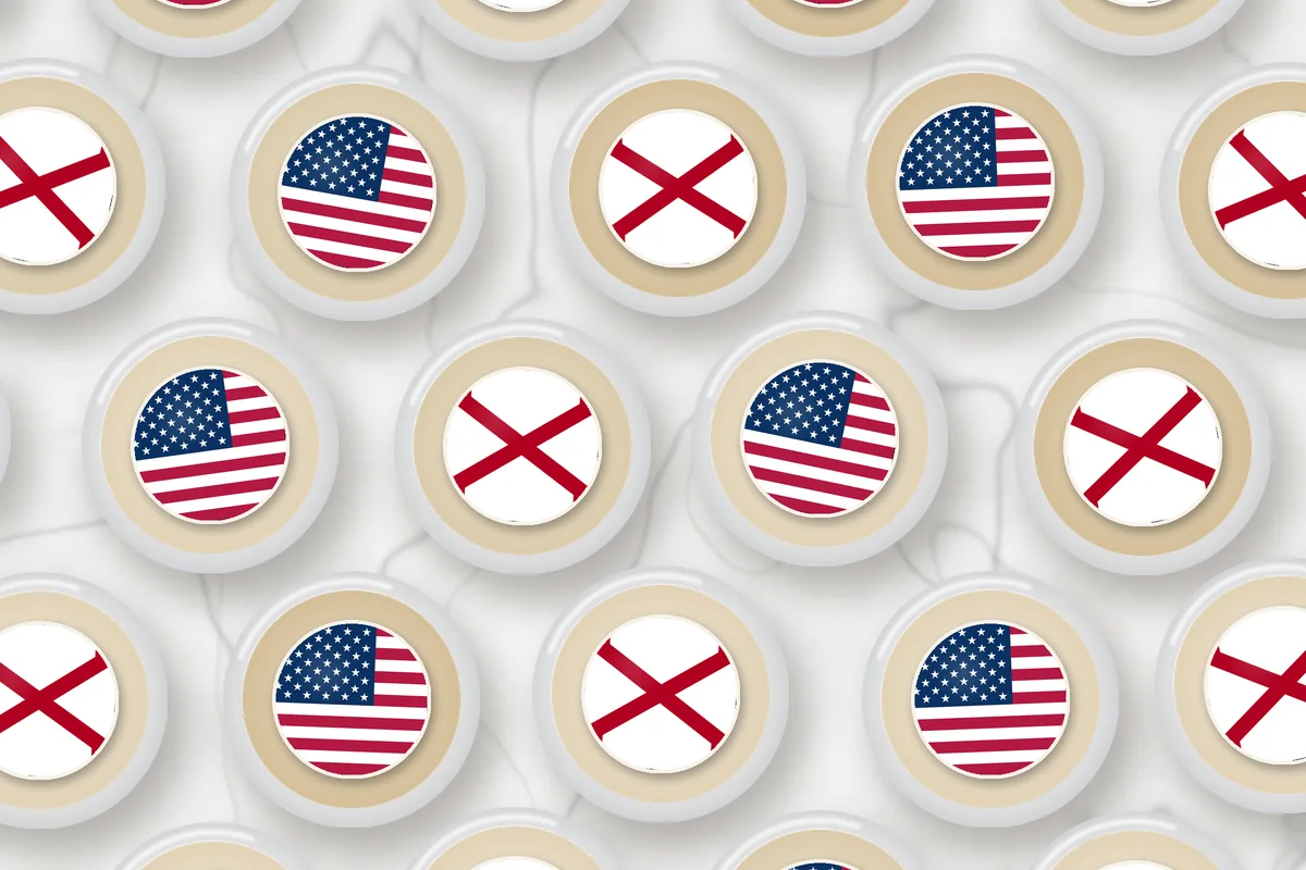 Cocktails topped with edible drink toppers printed with the Alabama flag and the American flag