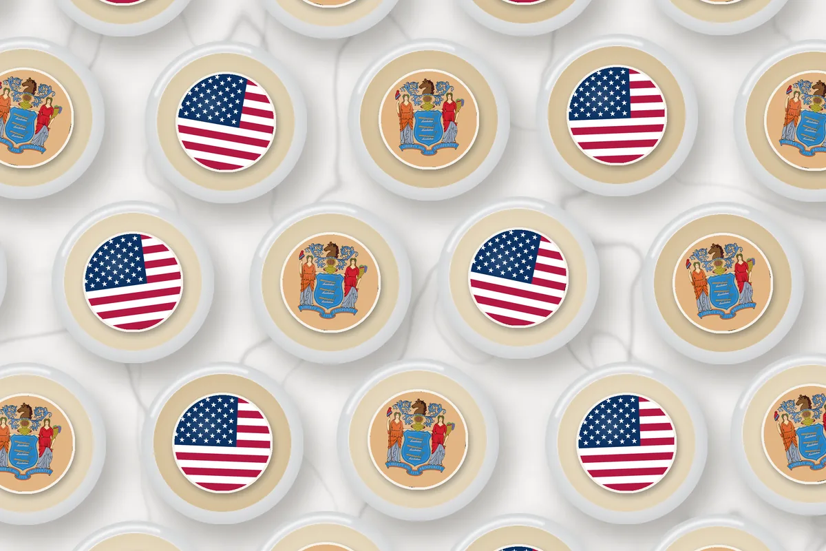 Cocktails topped with edible drink toppers printed with the New Jersey flag and the American flag