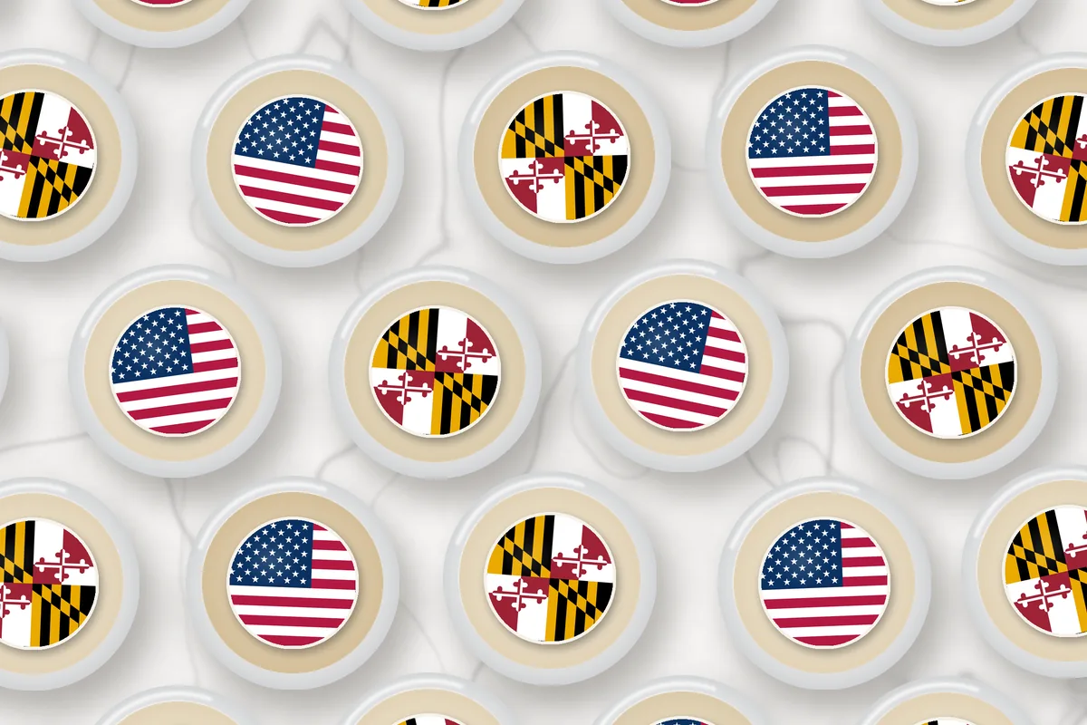 Cocktails topped with edible drink toppers printed with the Maryland flag and the American flag