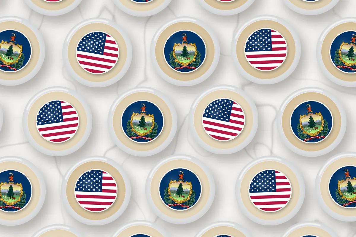 Cocktails topped with edible drink toppers printed with the Vermont flag and the American flag