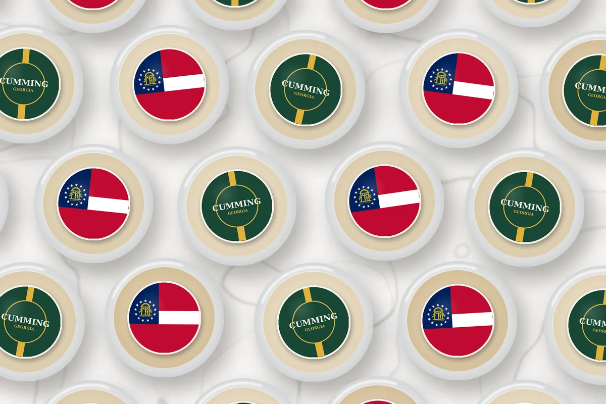Cocktails topped with edible drink toppers printed with Cumming name toppers and the Georgia flag