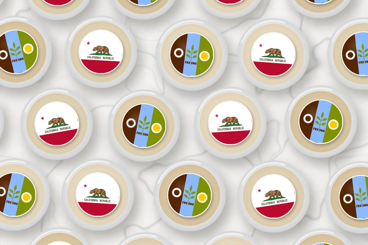 Cocktails topped with edible drink toppers printed with the Fresno city flag and the California flag