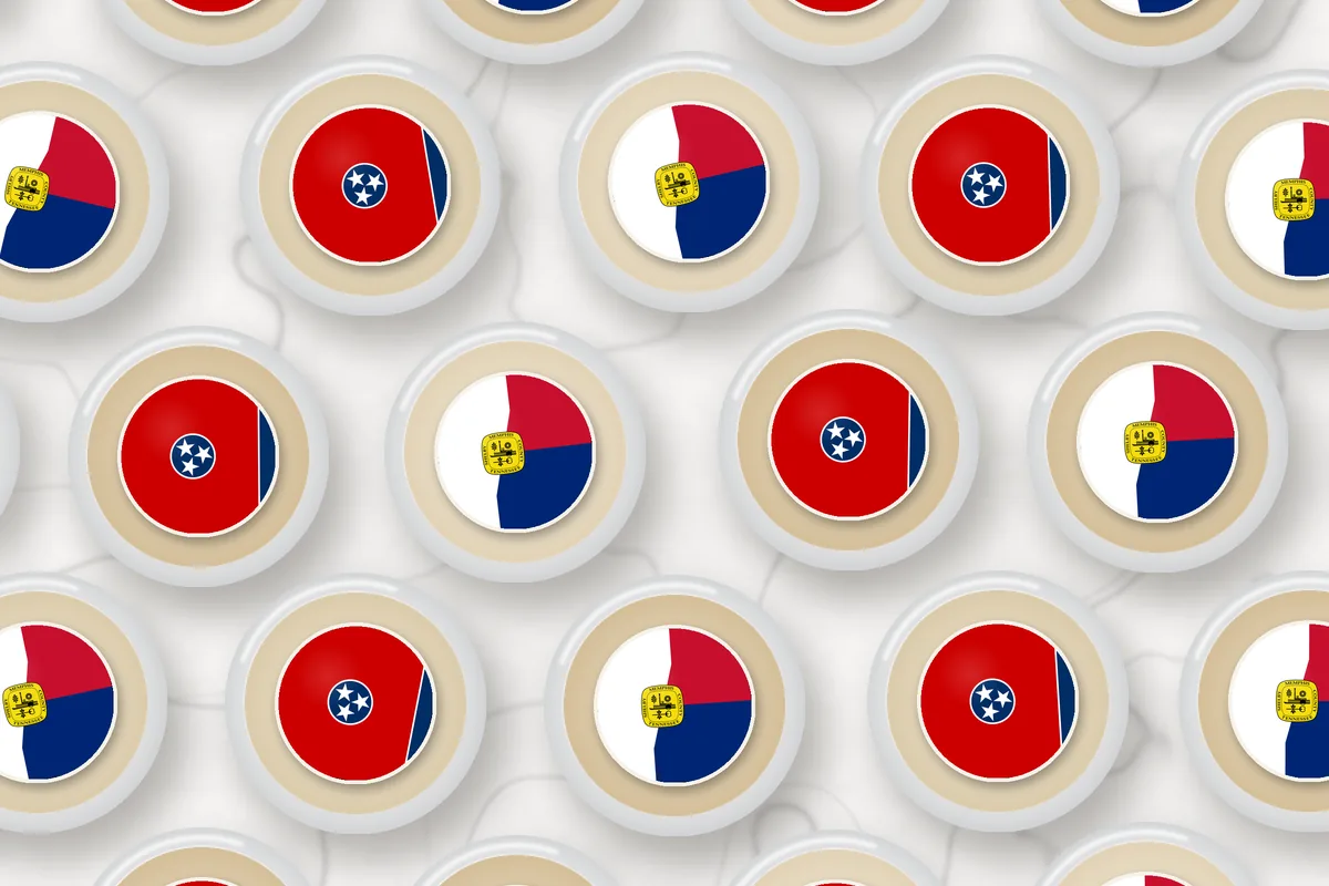 Cocktails topped with edible drink toppers printed with the Memphis city flag and the Tennessee flag