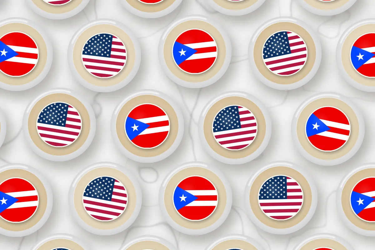 Cocktails topped with edible drink toppers printed with the Puerto Rico flag and the US flag