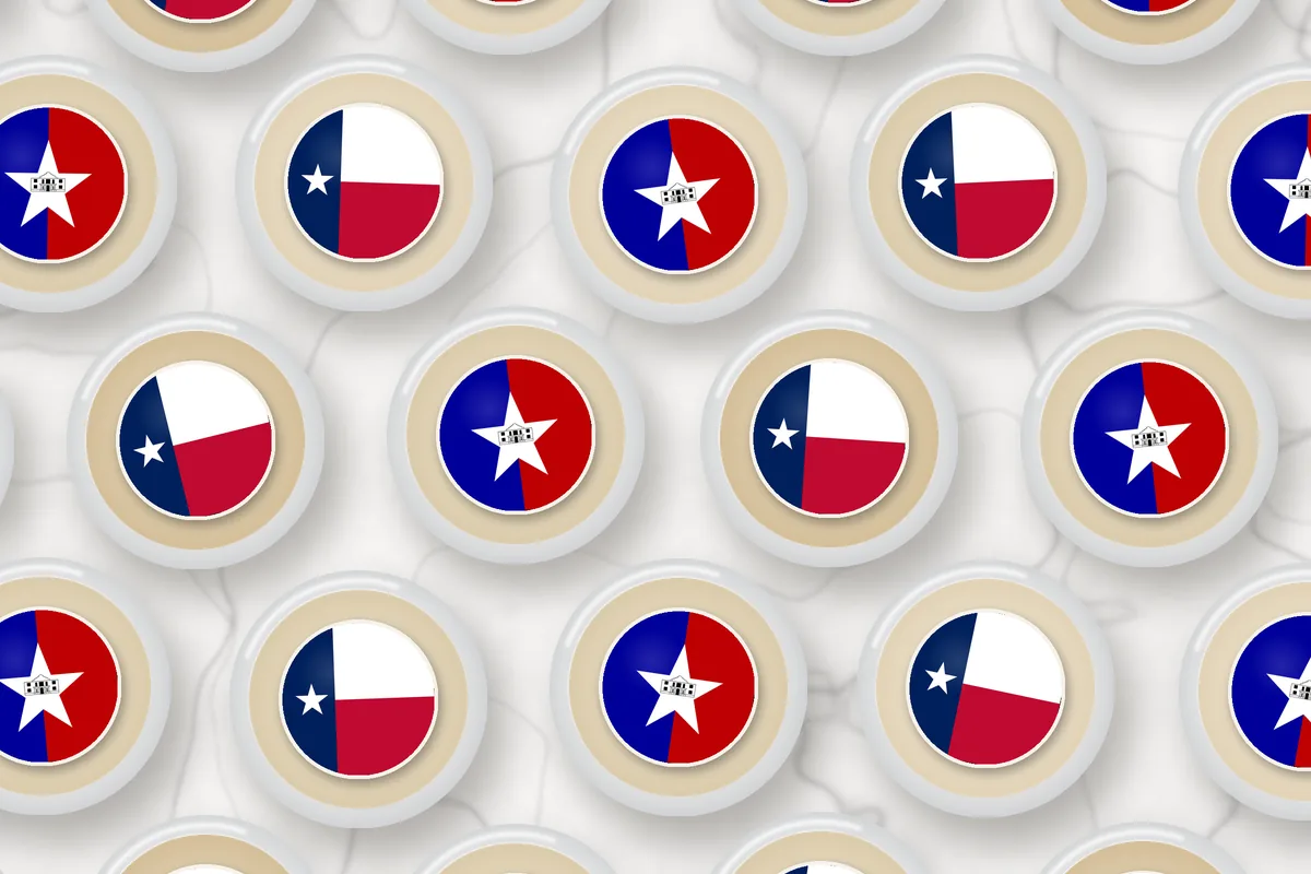 Cocktails topped with edible drink toppers printed with the San Antonio city flag and the Texas flag