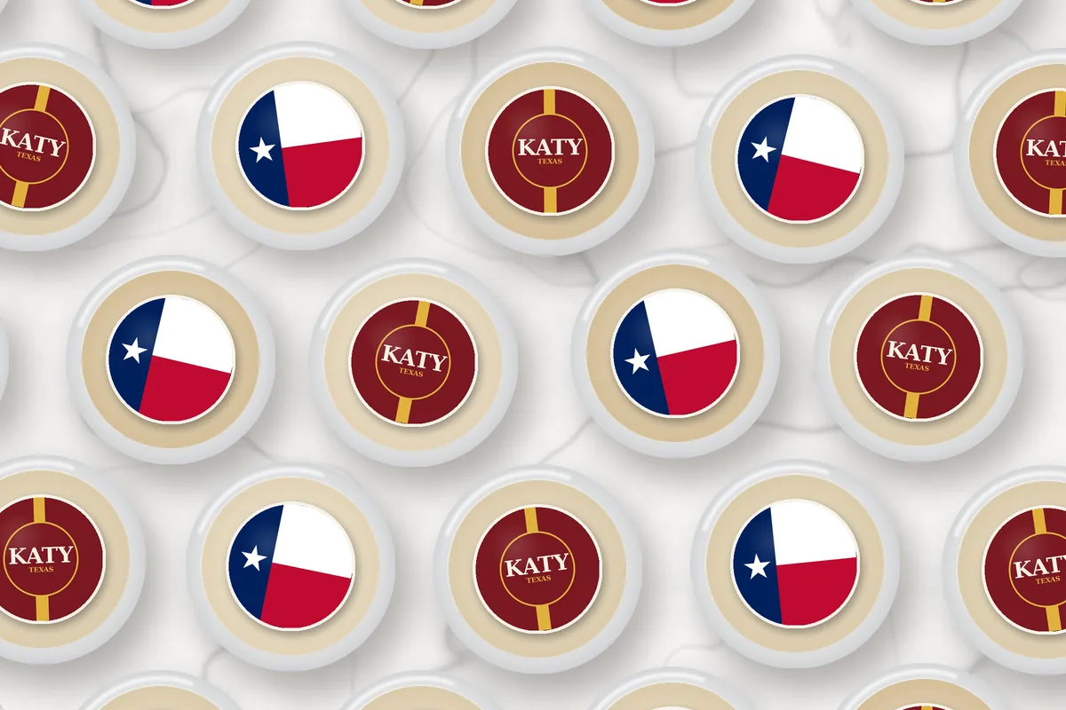 Cocktails topped with edible drink toppers printed with Katy name toppers and the Texas flag
