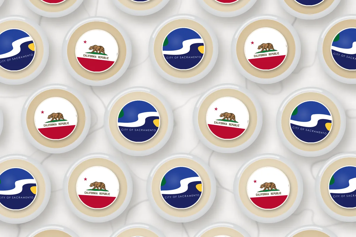Cocktails topped with edible drink toppers printed with the Sacramento city flag and the California flag