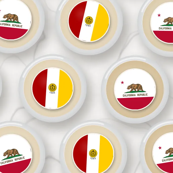Edible toppers printed with the San Diego city flag and the California flag