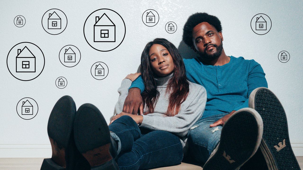 Couple sitting on the floor dreaming about new home ownership surrounded by house icons. Couple sitting on the floor dreaming about new home ownership surrounded by house icons.