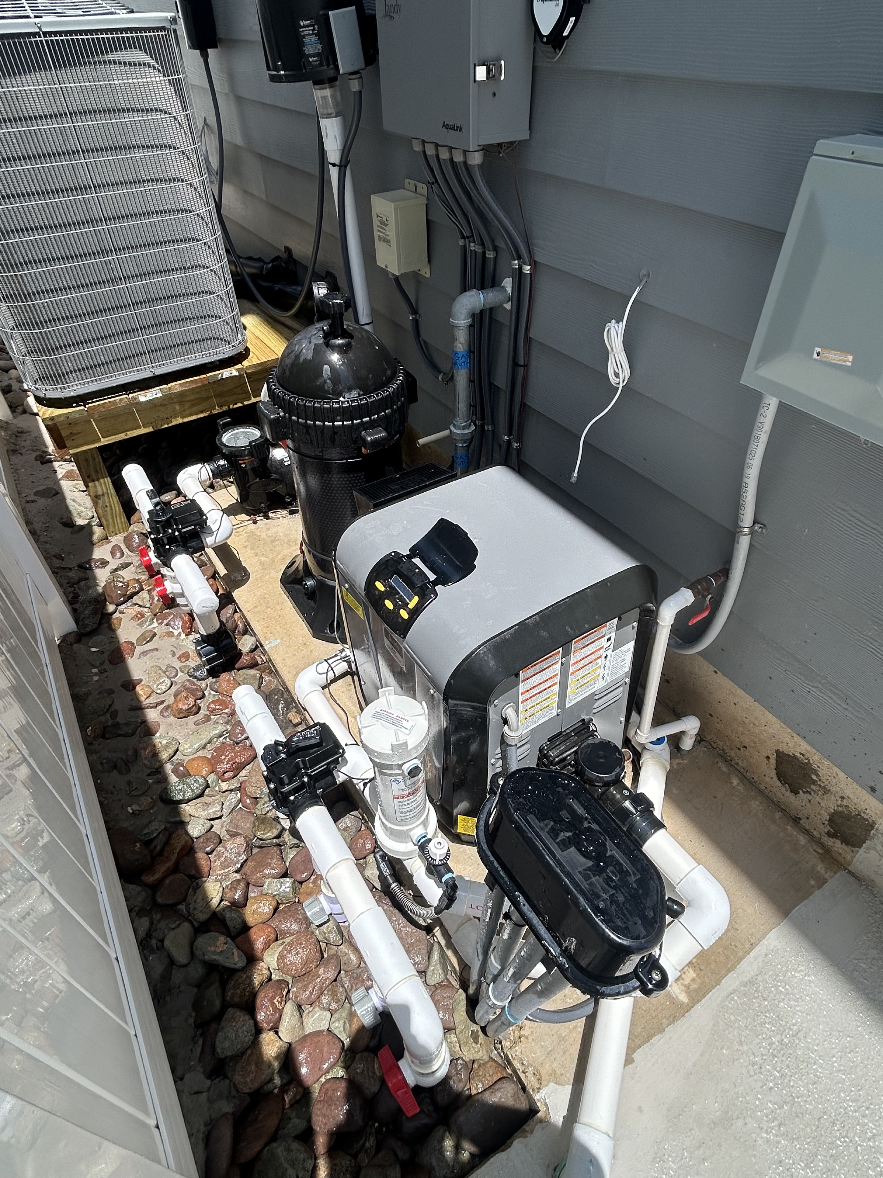 Pool equipment installation in Corpus Christi backyard pool pad