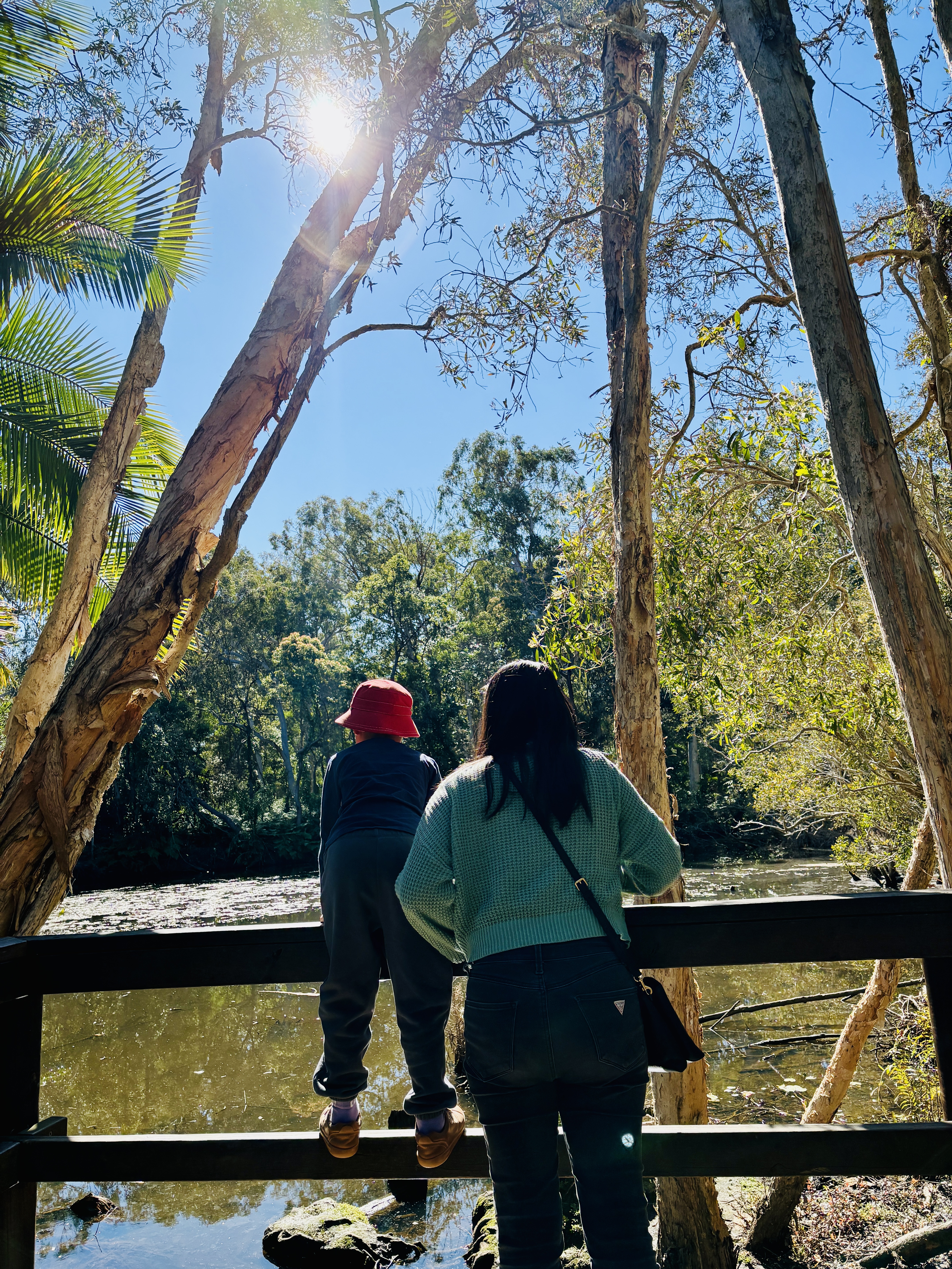 mother and child looking out into nature