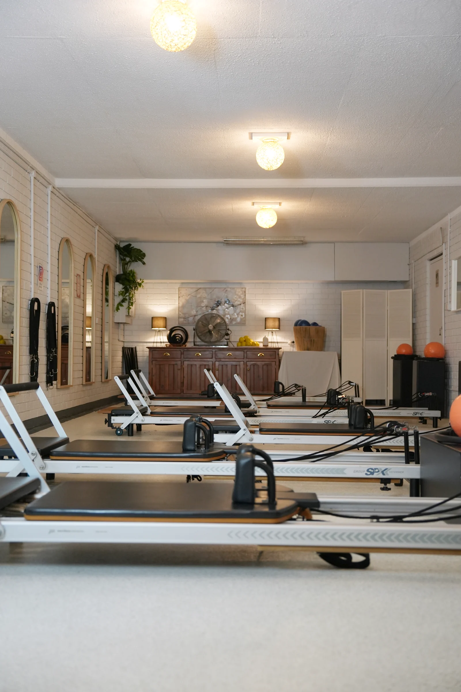 Warm, friendly atmosphere at Pilates at Sarah's studio in Point Clare, where clients enjoy a supportive Pilates community