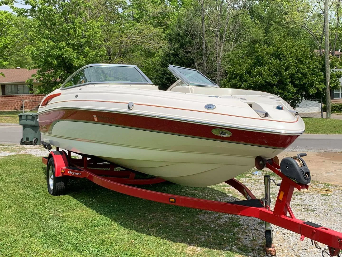 Bryant sport boat hull polished to high gloss reflection on trailer ($12/linear ft)