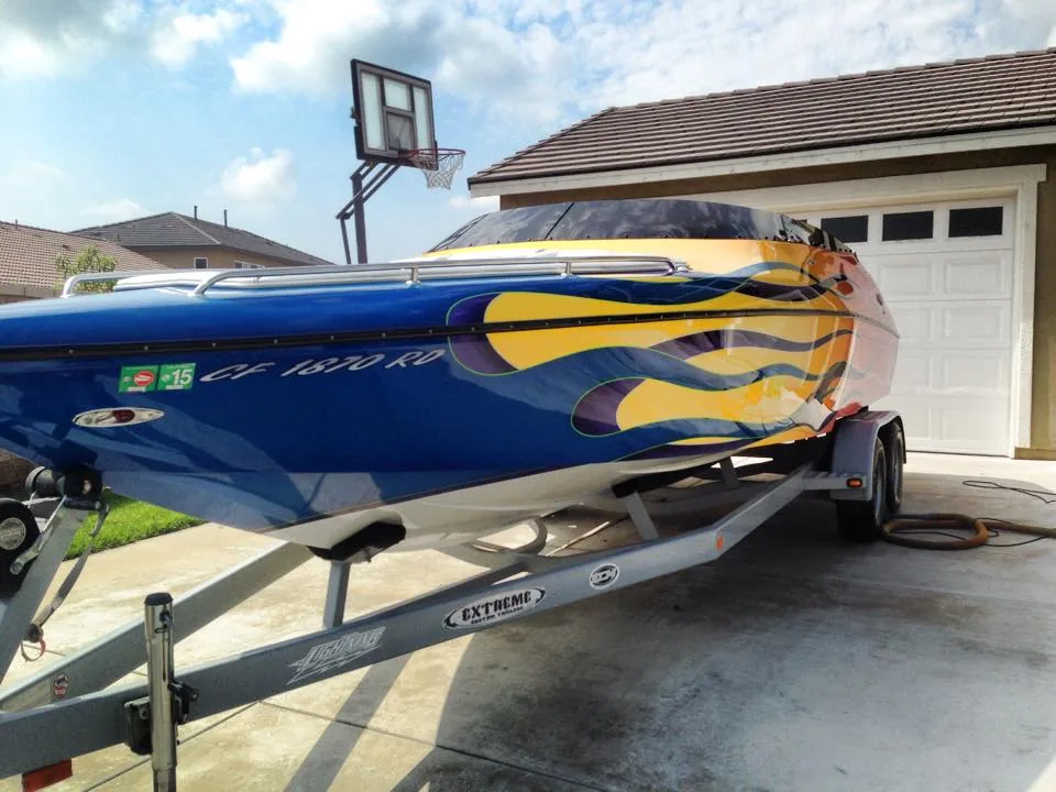 Custom flame painted marine speedboat detailed and polished on trailer