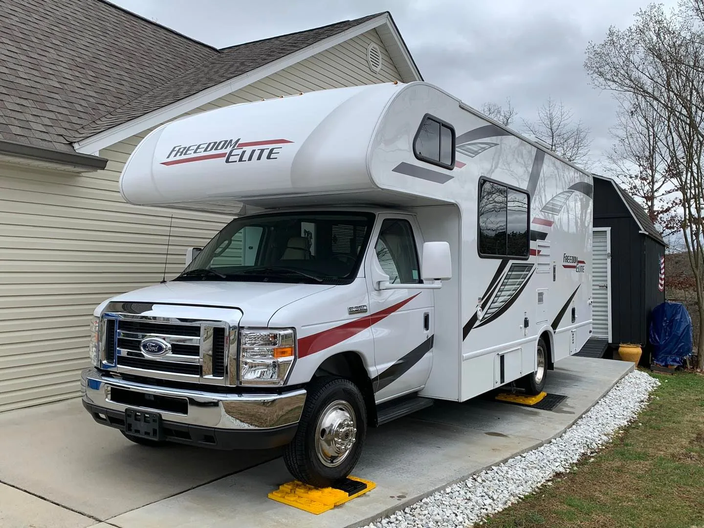 Freedom Elite Class C RV detailed with front cap bug removal and roof drain clearing